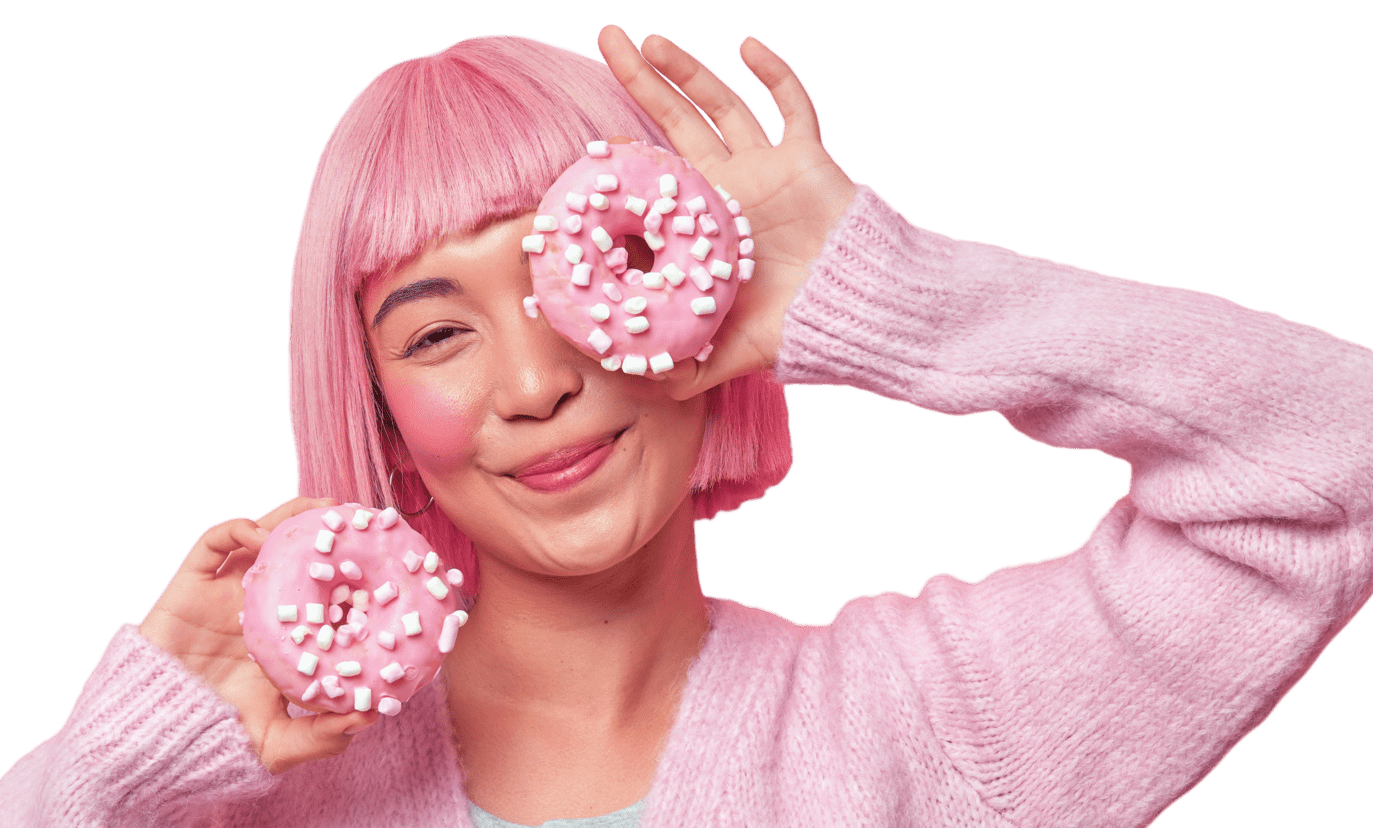 Girl holding pink donut